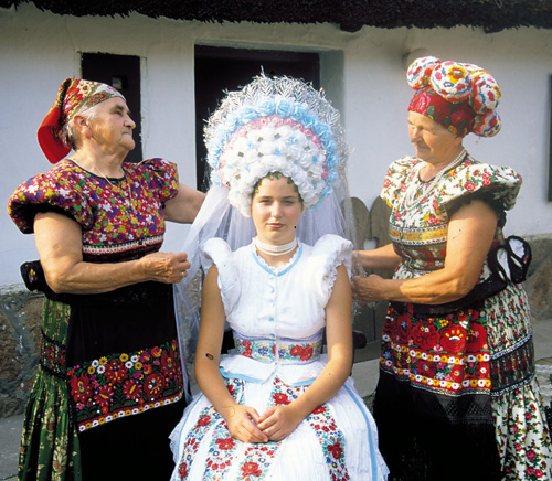 Modern Hungarian bride in traditional wedding attire