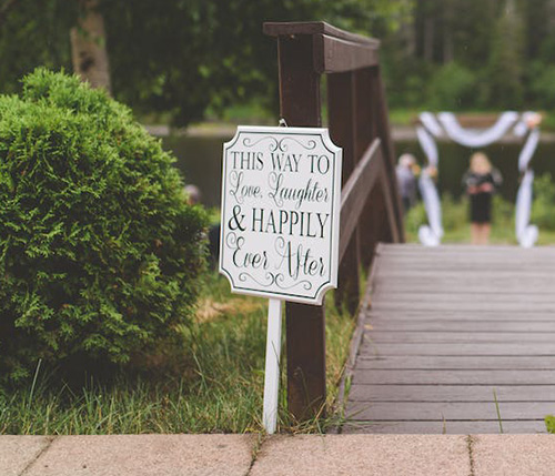 Use touchy-feely wedding signs