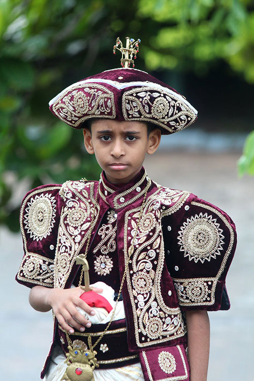 Striking groom’s wedding clothing in Sri Lanka. A ring boy could look like this