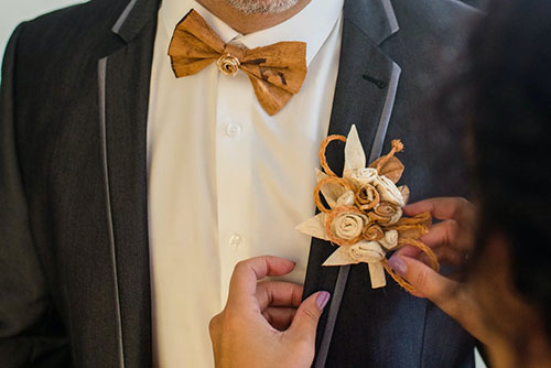 Groom’s boutonnieres can be made from unusual materials