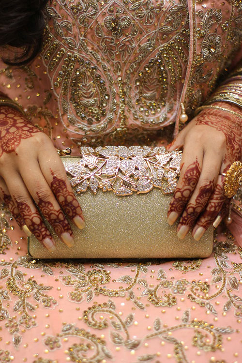 Pakistani bride with henna painting