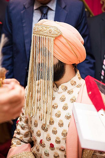 Pakistani grooms wear veils as well as brides